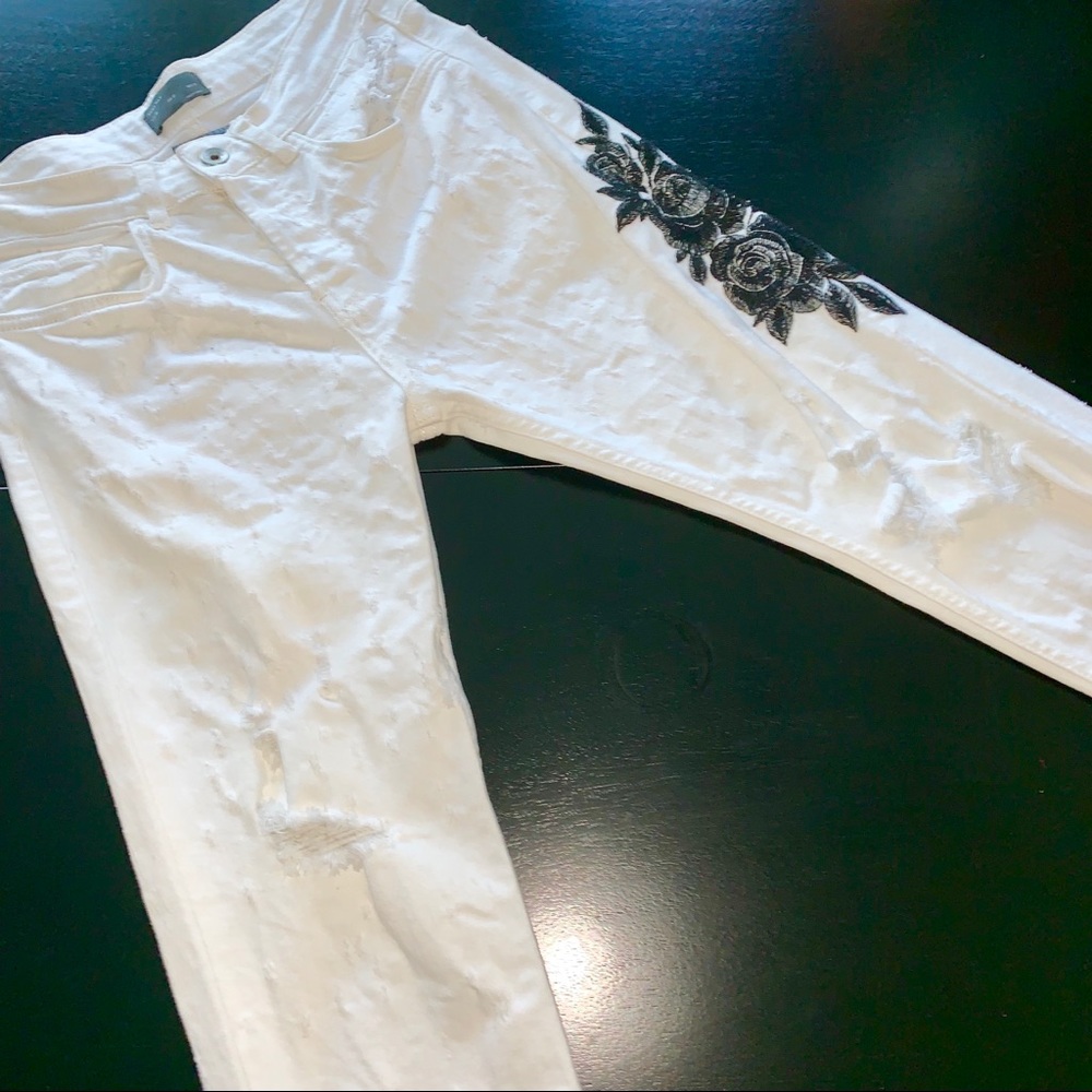 Embroidered distressed cropped white denim